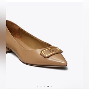 Tory Burch flats style is Georgia pointed toe flats 
Msrp is $328
